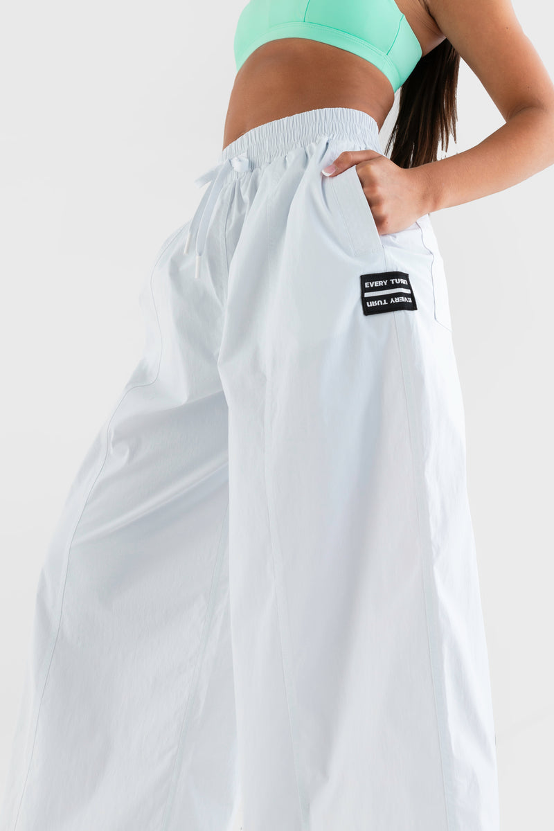 Highlighter Wide Leg Pant in White  - Side Up Close Details